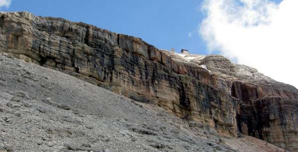 Under the rock cliff