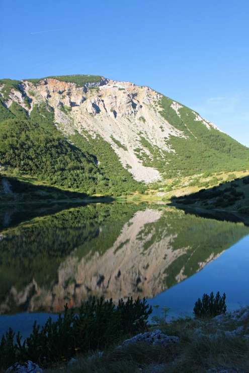 The reflection of the Great Sator in the lake