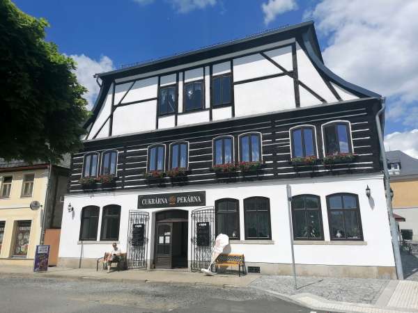 Corner house with a pastry shop